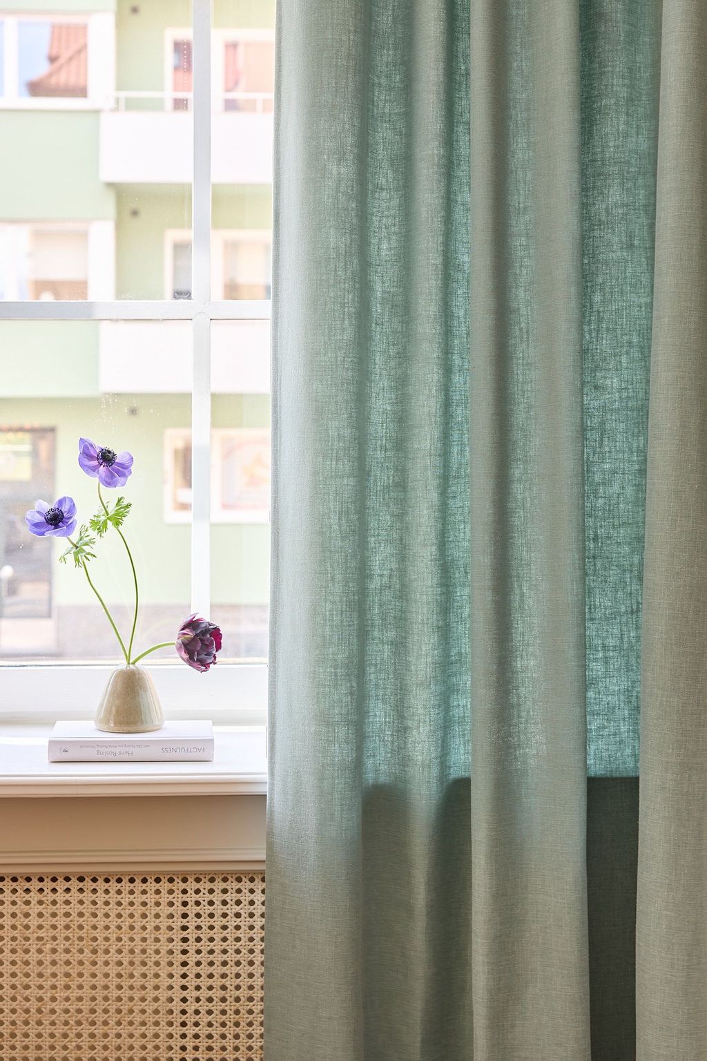 Teal green curtain in a cotton blend